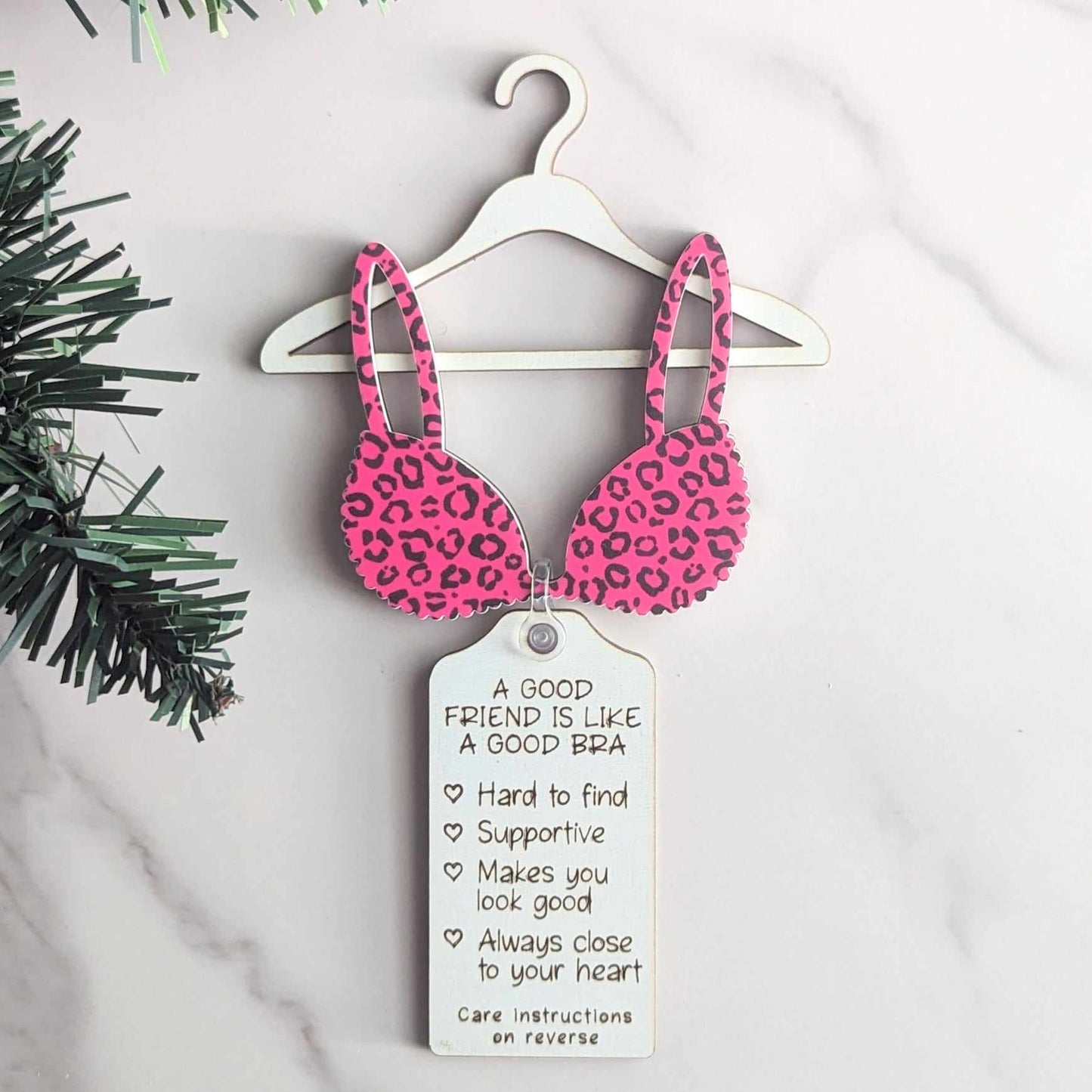 A Good Friend is Like A Good Bra Christmas Ornament. Pink Leopard Pattern Bra